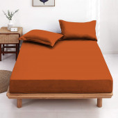 Drap housse cuivre 90x190 cm installé sur un lit
