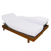protège matelas lit électrique forme drap housse posé sur un lit TPR
